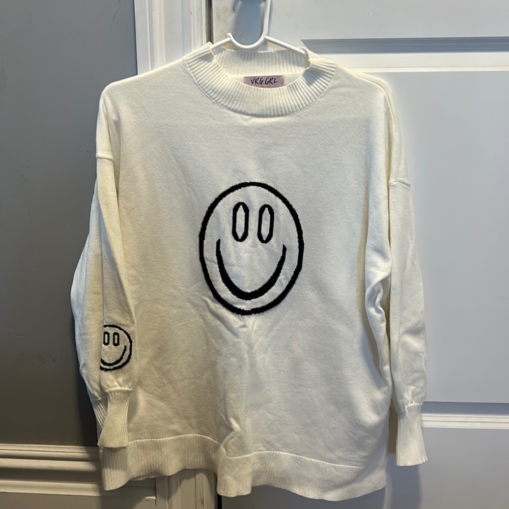 Verge girl smiley face sweater, worn once.